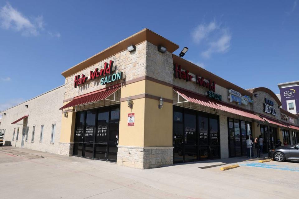 This photo shows the exterior of Hair World Salon on Thursday, May 12, 2022 in Dallas. Dallas’ police chief said Friday, May 13, 2022 that a shooting that injured three women in a hair salon in the city’s Koreatown might have been a hate crime as he announced that it could be connected to two other shootings at businesses run by Asian Americans. (Rebecca Slezak/The Dallas Morning News via AP)