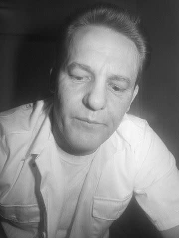 <p>Bettmann/Getty</p> Charles Harrelson in a Harris County Jail visitor's room.