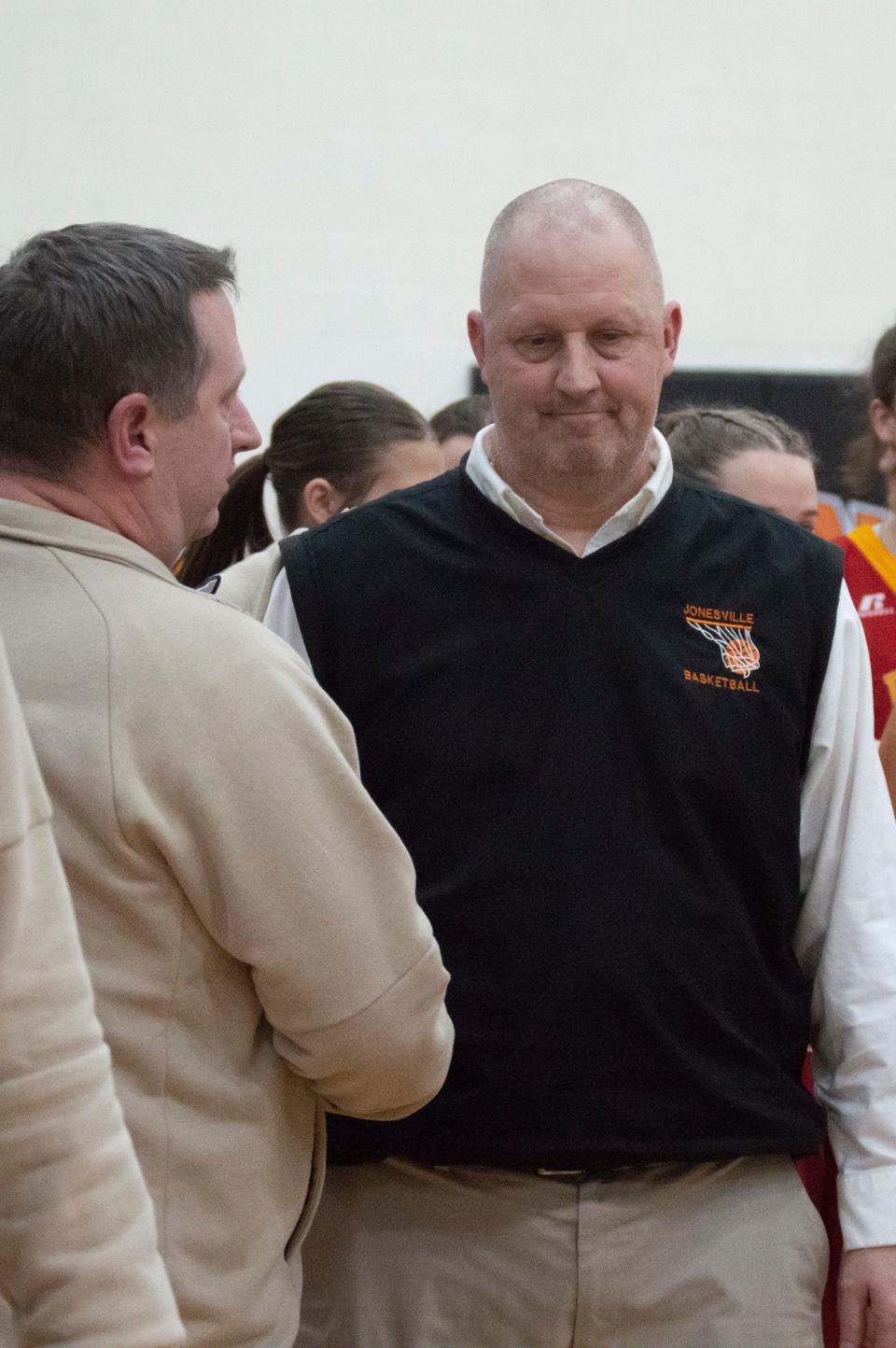 Comet head coach Tom Dunn and Reading head coach Kevin Bailey shake hands and discuss the game after Reading's 38-31 victory.