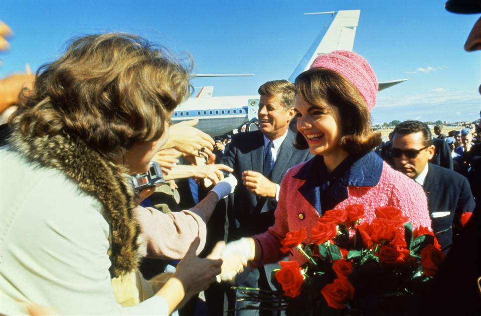 <p>President John F. Kennedy and his wife, Jacqueline, are greeted by an enthusiastic crowd upon their arrival at Dallas Love Field, Nov. 22, 1963. (Photo: Art Rickerby/The LIFE Picture Collection/Getty Images) </p>