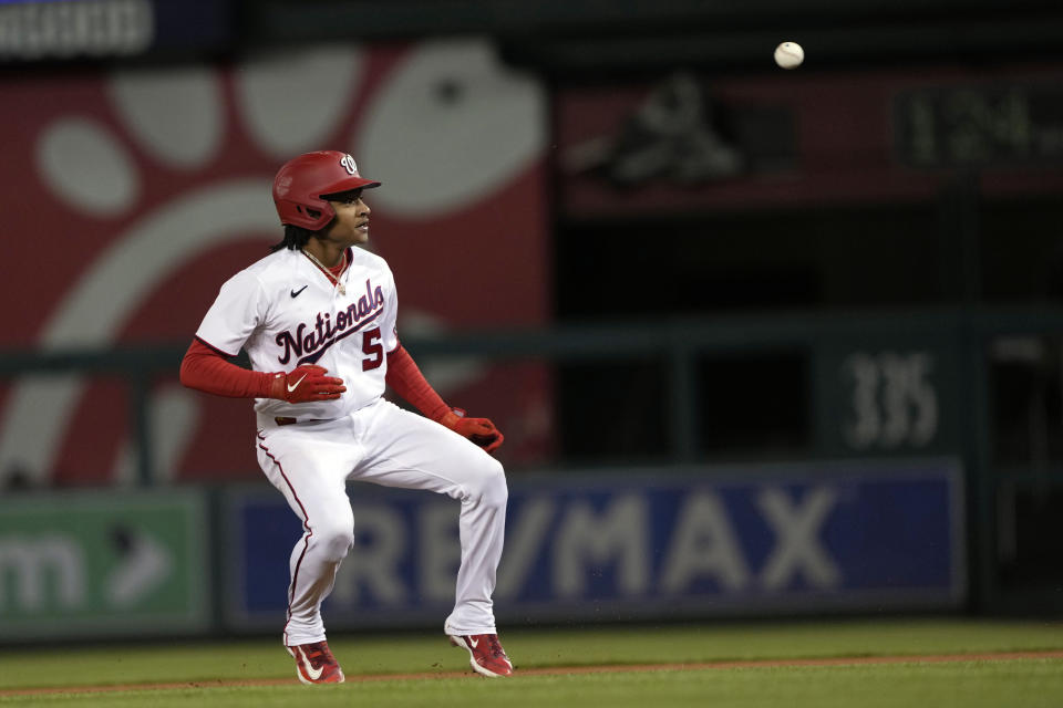 Washington Nationals' CJ Abrams (5) looks back to first as he is caught stealing second during the seventh inning of a baseball game against the Chicago Cubs in Washington, Wednesday, May 3, 2023. (AP Photo/Manuel Balce Ceneta)