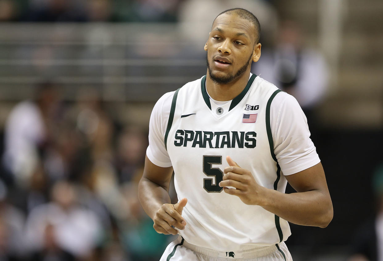 EAST LANSING, MI - FEBRUARY 13:  Adreian Payne #5 of the Michigan State Spartans looks towards the bench during the second half of the game against the Northwestern Wildcats at Breslin Center on February 13, 2014 in East Lansing, Michigan. The Spartans defeated the Wildcats 85-70.  (Photo by Leon Halip/Getty Images) 