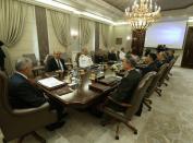 Turkey's Supreme Military Council (YAS) members meet under chairmanship of Turkish Prime Minister Binali Yildirim (L) at Cankaya Palace in Ankara in an image released by the Turkish Prime Minister's Press Office on July 28, 2016