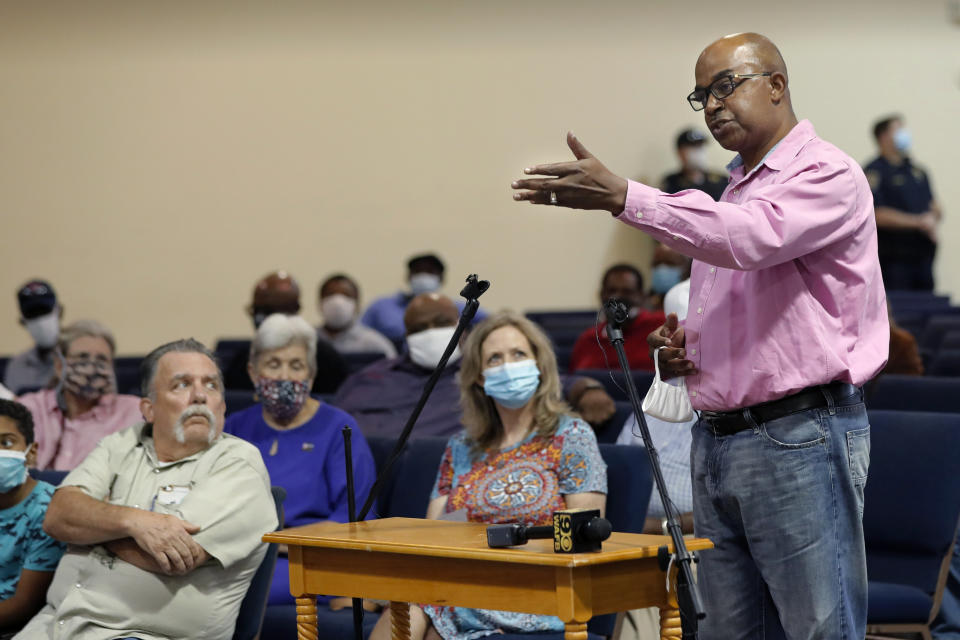 The Rev. John Sanders, pastor of the Second Baptist Church in Wilson, La. speaks in favor of removing a statue of a Confederate soldier in front of the East Feliciana Parish courthouse, at a town hall meeting to discuss its fate, in Clinton, La., on June 30, 2020. As protests sparked by the death of George Floyd in Minneapolis focus attention on the hundreds of Confederate statues still standing across the Southern landscape, officials in the rural parish of roughly 20,000 people recently voted to leave the statue where it is. (AP Photo/Gerald Herbert)