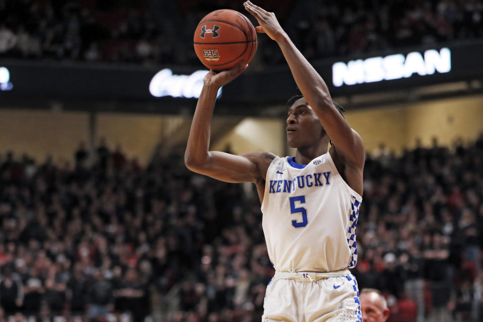 Kentucky's Immanuel Quickley (5) shoots the ball for three points during the first half of an NCAA college basketball game against Texas Tech, Saturday, Jan. 25, 2020, in Lubbock, Texas. (AP Photo/Brad Tollefson)