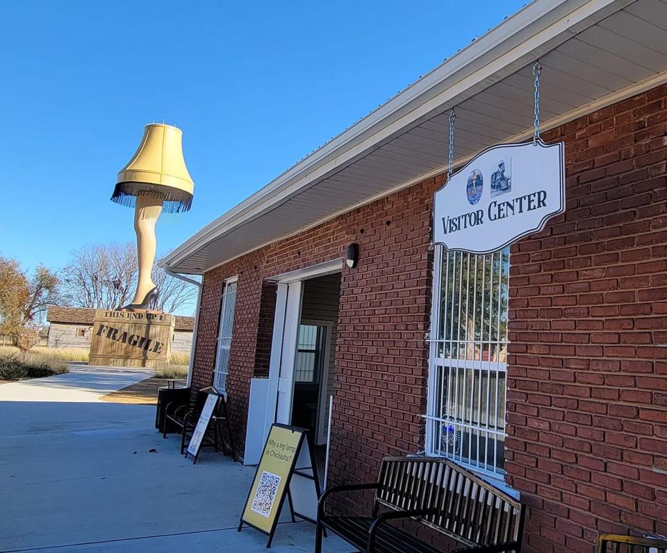 The Downtown Mercantile and Visitors Center, adjacent to the 50-foot-tall Chickasha Leg Lamp statue, is seen Nov. 28 in downtown Chickasha. The mercantile opened in August after the leg lamp, which bowed last November, provided a popular tourist attraction for the small Oklahoma town.