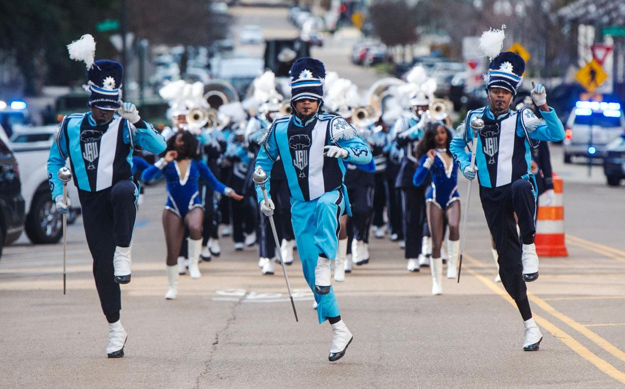 Jackson State University's Sonic Boom of the South makes its way up Capitol Street in Jackson, Miss.