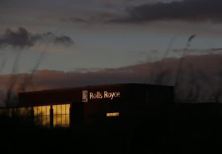 The setting sun reflects on the windows of a building at Rolls-Royce in Derby, central England , November 4, 2014. REUTERS/Darren Staples