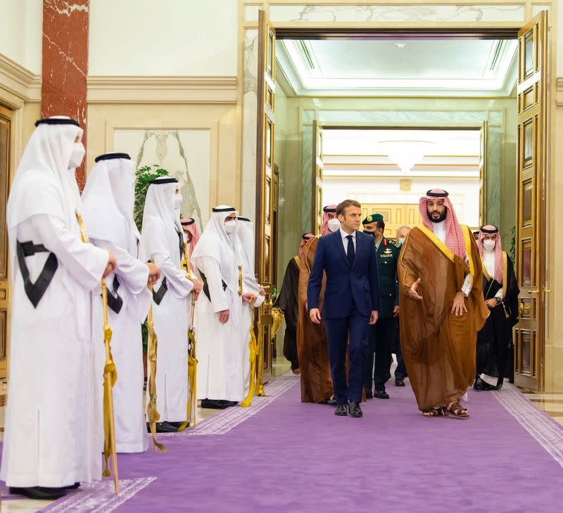 FILE PHOTO: Saudi Crown Prince, Mohammed bin Salman, receives French President Emmanuel Macron in Jeddah, Saudi Arabia