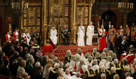 Britain's Queen Elizabeth sits on the throne as she waits for members of the House of Commons to arrive before reading the Queen's Speech during the State Opening of Parliament in the House of Lords in London, Britain May 18, 2016. REUTERS/Alastair Grant/Pool