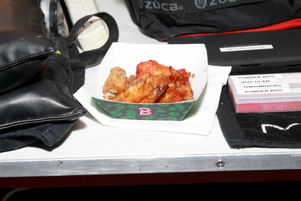 NEW YORK, NEW YORK - FEBRUARY 09: Wings are served as Wingstop brings their Flavor World to Brandon Maxwell's New York Fashion Week Show on February 09, 2019 in New York City. (Photo by Bennett Raglin/Getty Images for Wingstop)