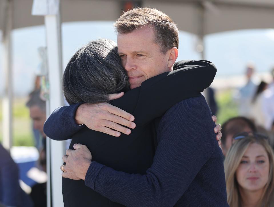 David Huntsman hugs Mary Beckerle as Huntsman Cancer Institute announces a new development in Utah County in Vineyard on Wednesday, June 21, 2023. | Jeffrey D. Allred, Deseret News