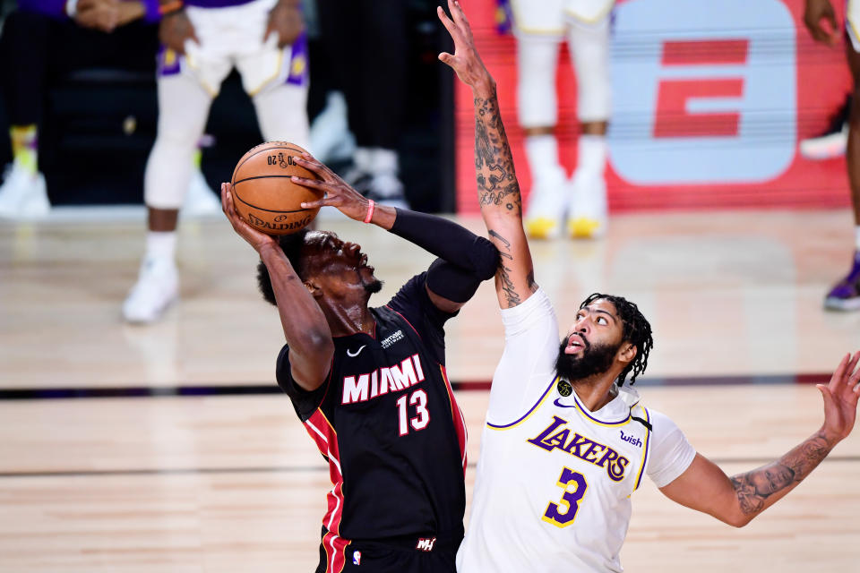 Bam Adebayo #13 of the Miami Heat drives the ball against Anthony Davis #3 of the Los Angeles Lakers during the fourth quarter in Game Six of the 2020 NBA Finals