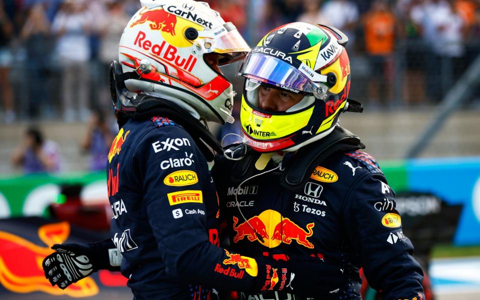 First place qualifier Max Verstappen of Netherlands and Red Bull Racing and third place qualifier Sergio Perez of Mexico and Red Bull Racing celebrate in parc ferme during qualifying ahead of the F1 Grand Prix of USA at Circuit of The Americas on October 23, 2021 in Austin, Texas - Jared C. Tilton 