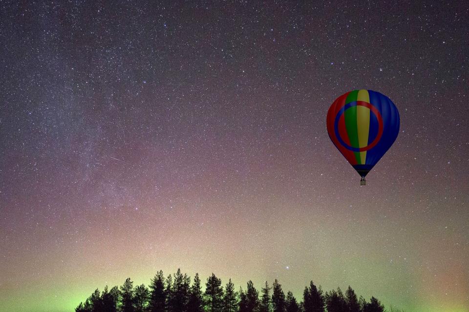 hot air balloon in the sky, northern lights