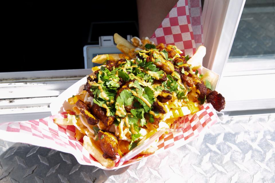 The Banh Mi Fries from local food truck Fatty's Third Coast at the inaugural Shoreline Food Truck Festival on Saturday, Feb. 25, 2023.