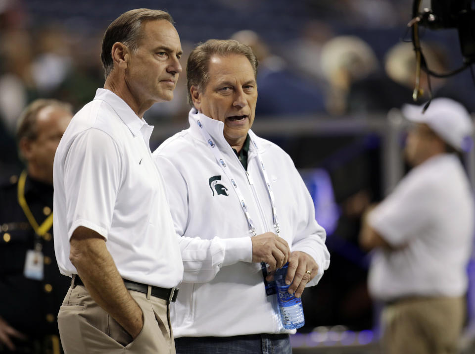Mark Dantonio, left, and Tom Izzo may be targeted in the Michigan State abuse scandal. (AP)