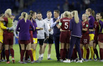 England head coach Philip Neville, center right talks to the players after the Women's World Cup Group D soccer match between England and Argentina at the Stade Oceane in Le Havre, France, Friday, June 14, 2019. (AP Photo/Alessandra Tarantino)