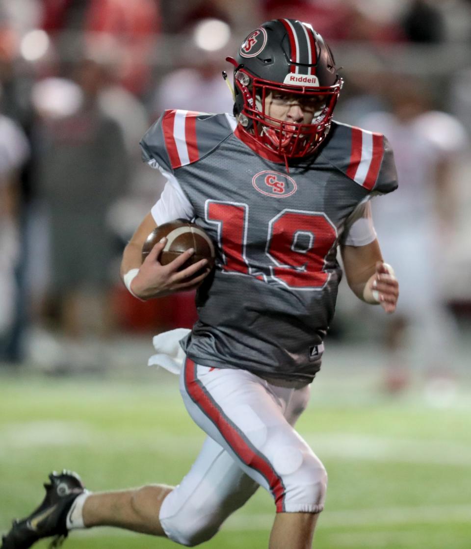 Canton South quarterback Jack "Poochie" Snyder breaks free on a long run against Northwest, Friday, Oct. 21, 2022.