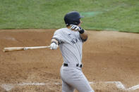 New York Yankees' Mike Tauchman follows through after hitting a two-run single off Philadelphia Phillies starting pitcher Zach Eflin during the second inning of a baseball game, Thursday, Aug. 6, 2020, in Philadelphia. (AP Photo/Matt Slocum)