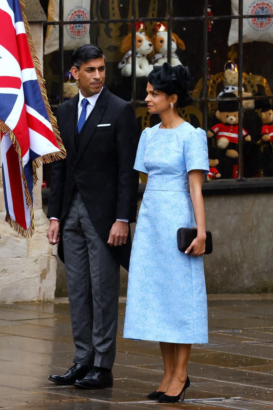 Britain's Prime Minister Rishi Sunak and wife of Britain's Prime Minister Rishi Sunak Akshata Murty arrive at Westminster Abbey in central London on May 6, 2023, ahead of the coronations of Britain's King Charles III and Britain's Camilla, Queen Consort. - The set-piece coronation is the first in Britain in 70 years, and only the second in history to be televised. Charles will be the 40th reigning monarch to be crowned at the central London church since King William I in 1066. Outside the UK, he is also king of 14 other Commonwealth countries, including Australia, Canada and New Zealand. Camilla, his second wife, will be crowned queen alongside him, and be known as Queen Camilla after the ceremony. (Photo by Odd ANDERSEN / AFP) (Photo by ODD ANDERSEN/AFP via Getty Images)