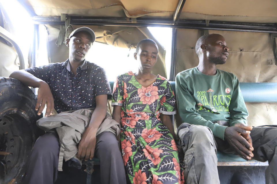 Some of the people who are suspected followers of a Christian Cult sit in a car after being rescued by police from a forest at Shakahola outskirts of Malindi town, Kenyan Coast Tuesday, April 25, 2023. Kenya's president William Ruto said Monday that the starvation deaths of dozens of followers of pastor Paul Makenzi, who was arrested on suspicion of telling his followers to fast to death in order to meet Jesus, is akin to terrorism (AP Photo)