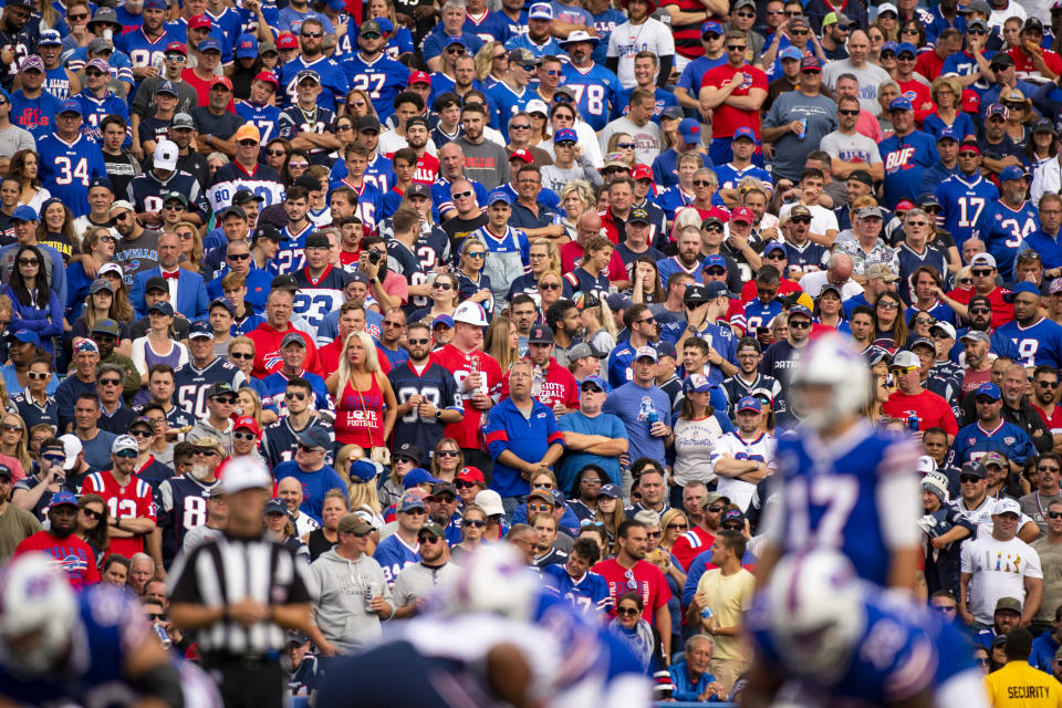 Fans watch a game between the Buffalo Bills and the New England Patriots on Sept. 29, 2019. They play each another in a playoff game on Sunday.  (Brett Carlsen/Getty Images)