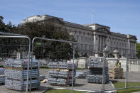 Building work in preparation for the Platinum Jubilee celebrations take place in front of Buckingham Palace in London, Friday, May 6, 2022. Britain's Queen Elizabeth II acceded to the throne on the death of her father King George VI on Feb. 6, 1952, and the Platinum Jubilee bank holiday weekend celebrations will take place on June 2-5. (AP Photo/Kirsty Wigglesworth)