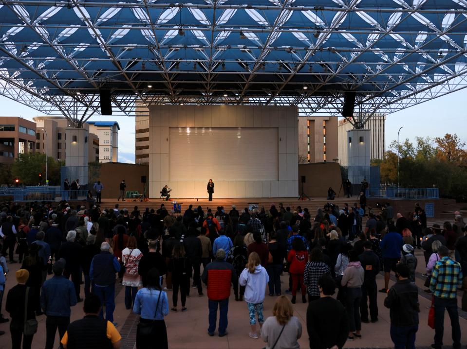 Members of the local film community gather at a candlelight vigil (REUTERS)