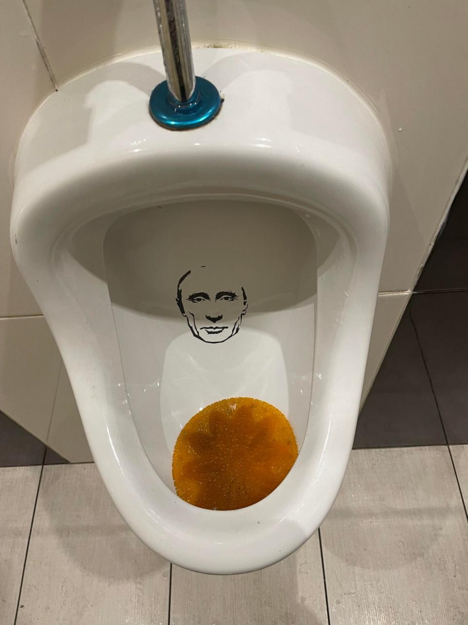 A urinal with a target: the face of Vladimir Putin (Kim Sengupta)