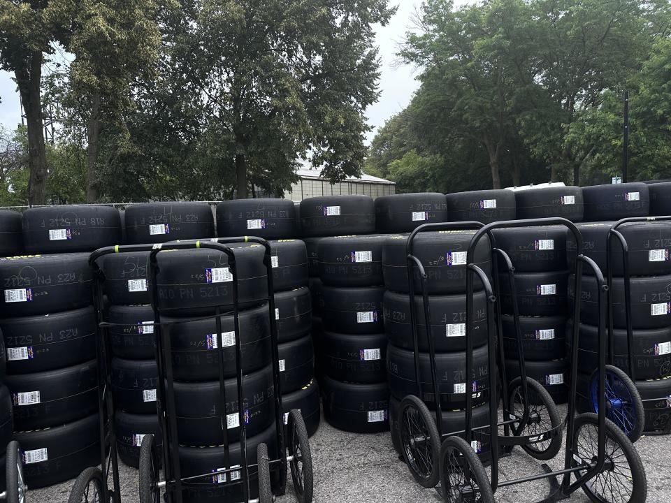 Hundreds of tires can be found spread across Grant Park in preparation for NASCAR Chicago's street race. / Credit: Analisa Novak/CBS News