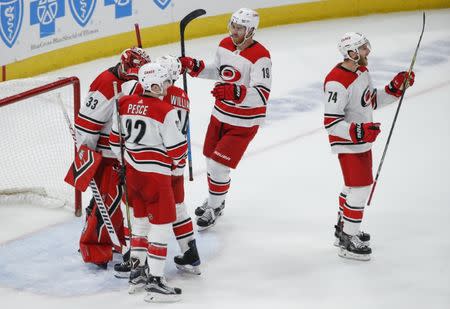 Nov 8, 2018; Chicago, IL, USA; Carolina Hurricanes players celebrate after defeating the Chicago Blackhawks at United Center. Kamil Krzaczynski-USA TODAY Sports