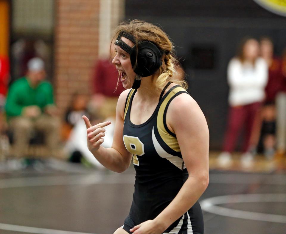 Penn senior Haylee Selis celebrates after winning the 135-pound championship match at the IHSGW girls wrestling semistate Friday, Jan. 5, 2024, at Penn High School in Mishawaka.