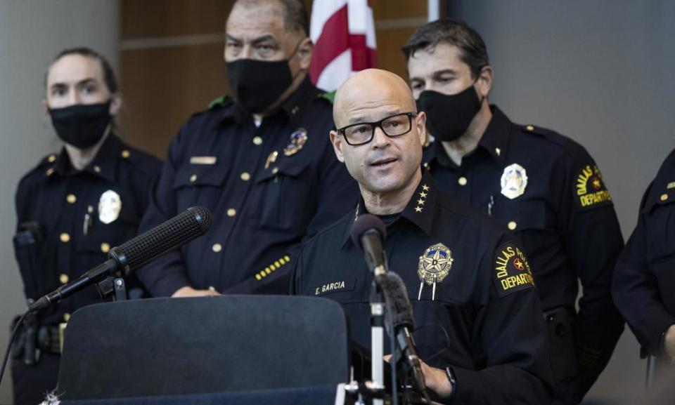 Eddie García, center, a Dallas police chief, during a press conference on the arrest and capital murder charges against fellow officer Bryan Riser.