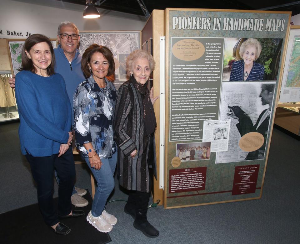 Bea McPherson, right, is shown with her children at the Military Mapping Maidens exhibit at MAPS Air Museum in Green on Friday, May 6, 2022. From left are Marena McPherson, Jim McPherson, Cheryl Loden and Bea McPherson. 