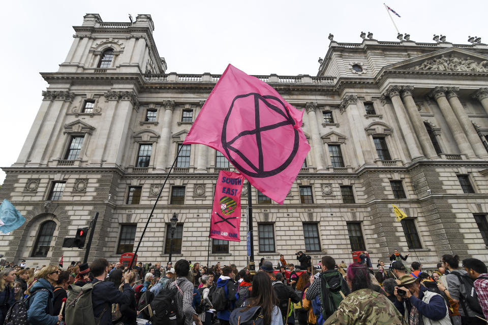 Climate activists gather at Parliament Street in London, Monday, Oct. 7, 2019. (Photo: Alberto Pezzali/AP)