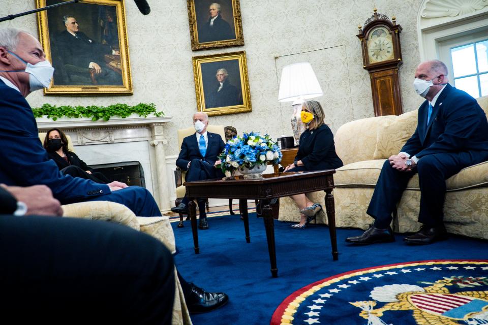 WASHINGTON, DC - FEBRUARY 12: President Joe Biden and Vice President Kamala Harris meet with governors and mayors, including Governor Asa Hutchinson (R-AR), Governor Michelle Lujan Grisham (D-NM) and Governor Larry Hogan (R-MD), in the Oval Office in Washington, D.C., on Friday, Feb. 12, 2021, to discuss the vital need to pass the American Rescue Plan, which will get more support to their communities and those on the front lines of the fight against COVID-19. (Photo by Pete Marovich-Pool/Getty Images) ORG XMIT: 775621253 ORIG FILE ID: 1301799167