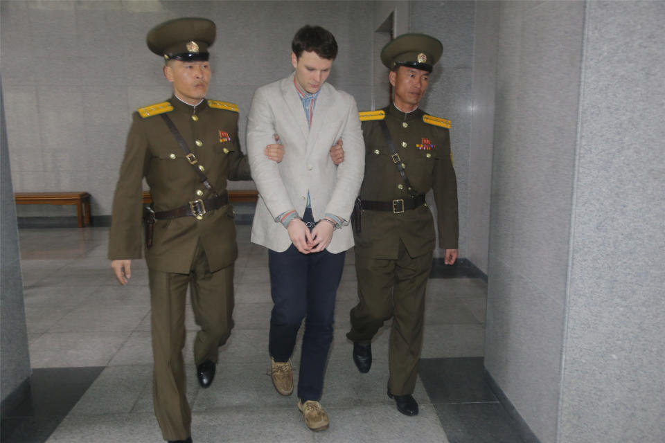 Otto Warmbier, center, arrives at his trial in North Korea in 2016.&nbsp;