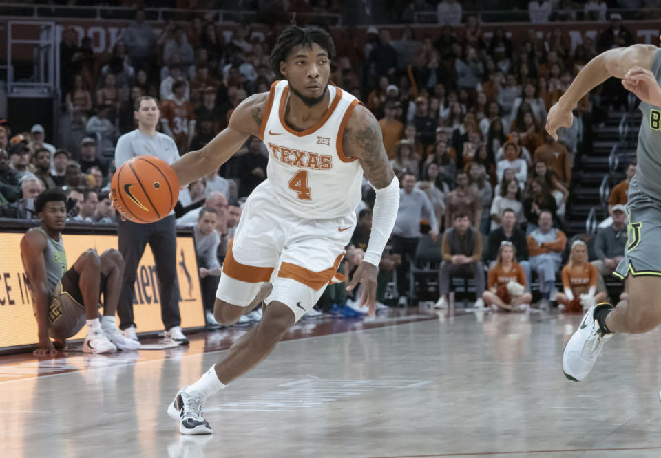 Tyrese Hunter drives the ball during the second half of an NCAA college basketball game against Baylor, Saturday, Jan. 20, 2024, in Austin, Texas. Texas won 75-73. (AP Photo/Michael Thomas)