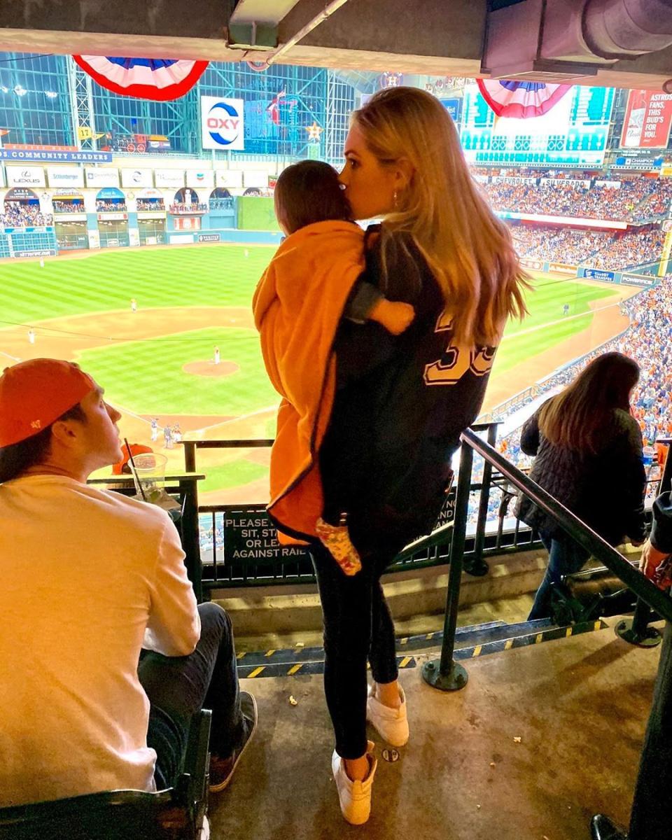 Kate Upton at a game with her baby