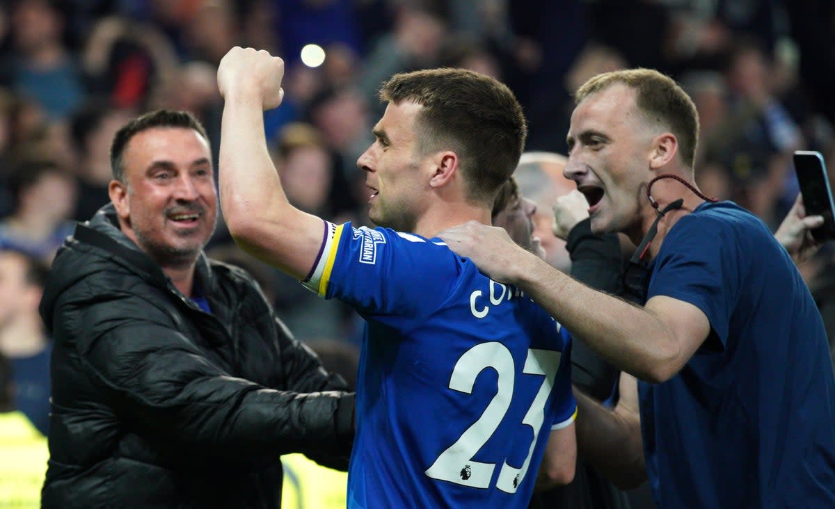 Fans mob Everton’s Seamus Coleman after the club secured their Premier League status (Peter Byrne/PA) (PA Wire)