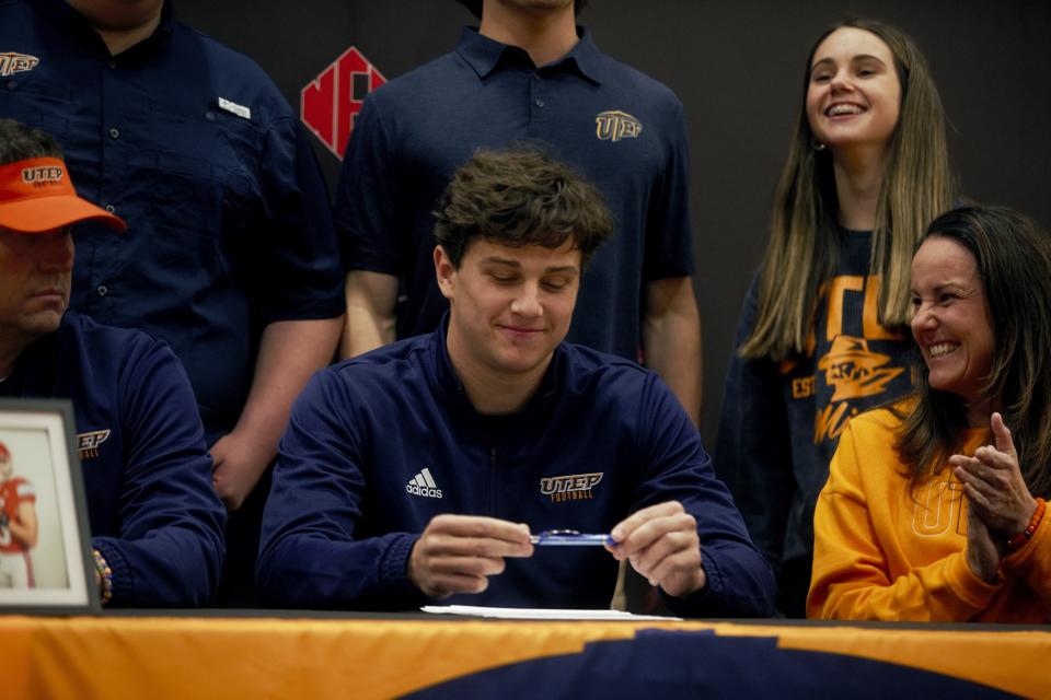 North Florida Christian senior quarterback JP Pickles signs his national letter of intent to play football at the University of Texas El Paso