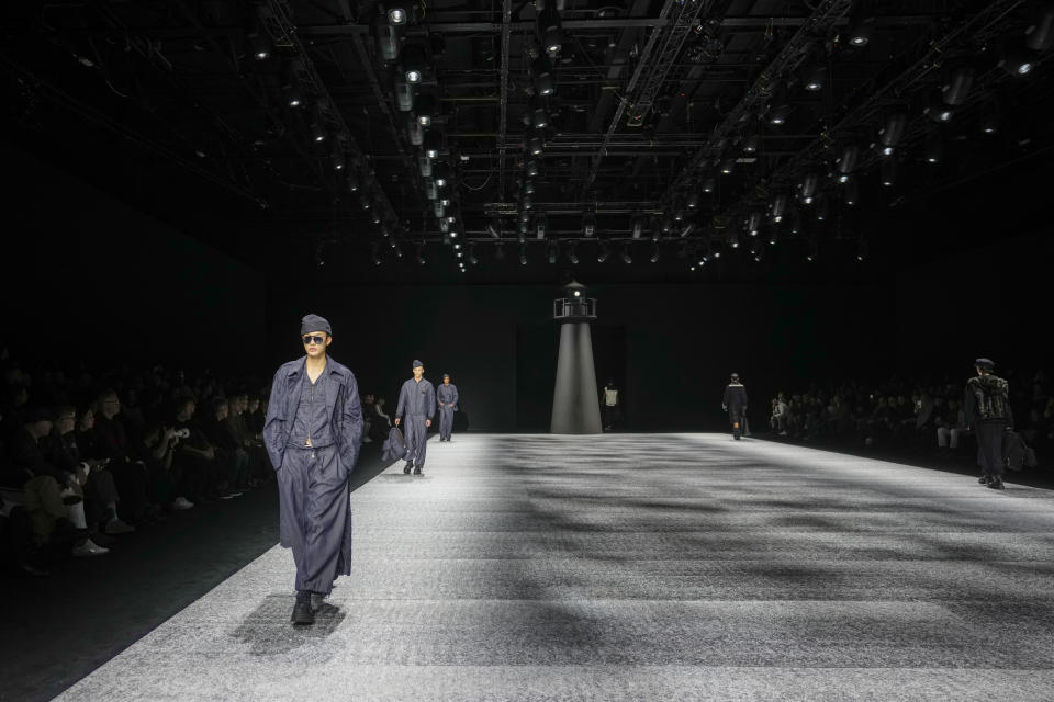 A model wears a creation as part of the men's Giorgio Armani Fall-Winter 2024-2025 collection, that was presented in Milan, Italy, Saturday, Jan. 13, 2024. (AP Photo/Luca Bruno).