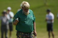 John Daly waves after making a putt on the 15th hole during the first round of the PGA Championship golf tournament, Thursday, May 19, 2022, in Tulsa, Okla. (AP Photo/Sue Ogrocki)