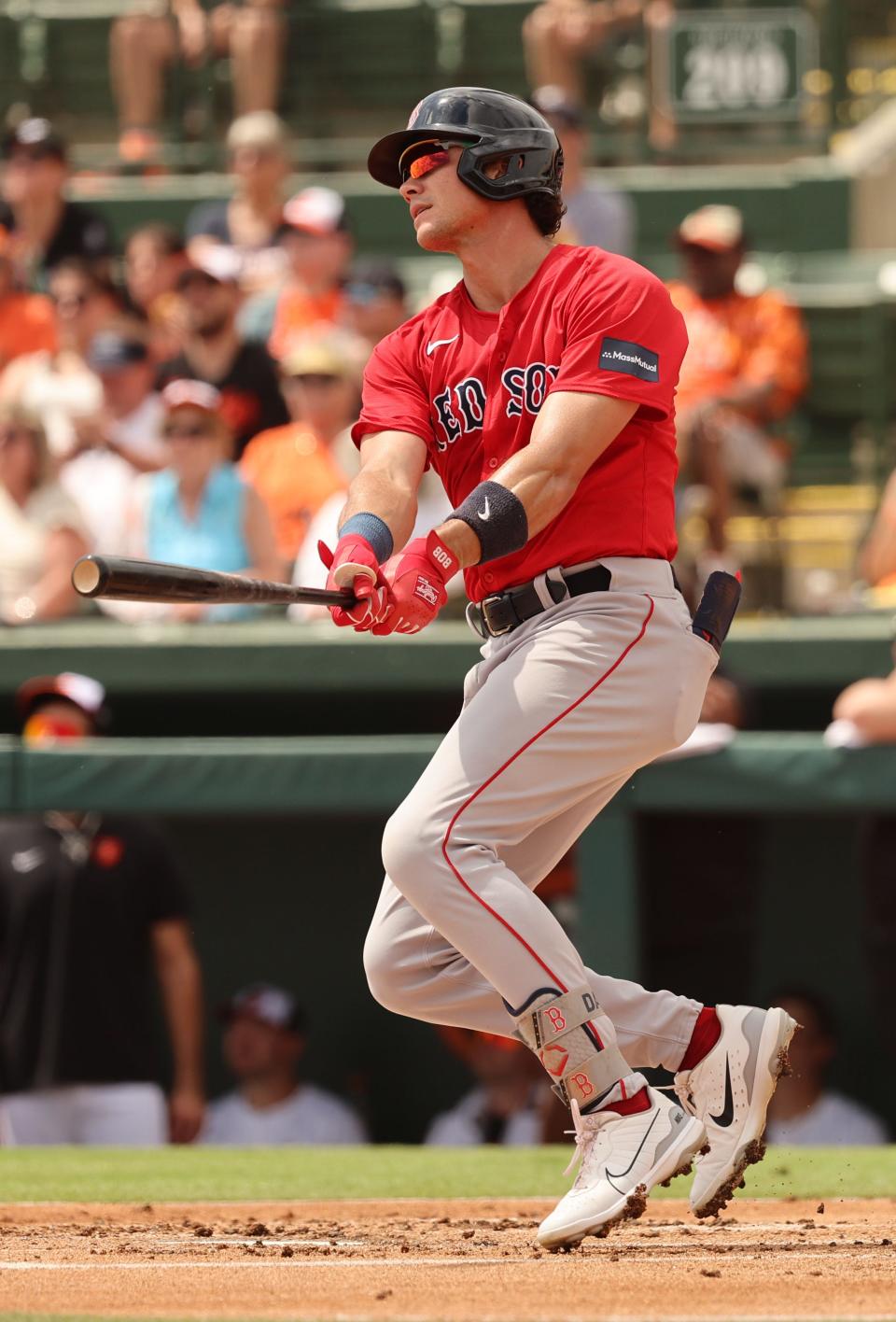 Boston Red Sox outfielder Bobby Dalbec (29) hits a home run during the first inning against the Baltimore Orioles at Ed Smith Stadium in Sarasota, Florida on Saturday, March 16, 2024