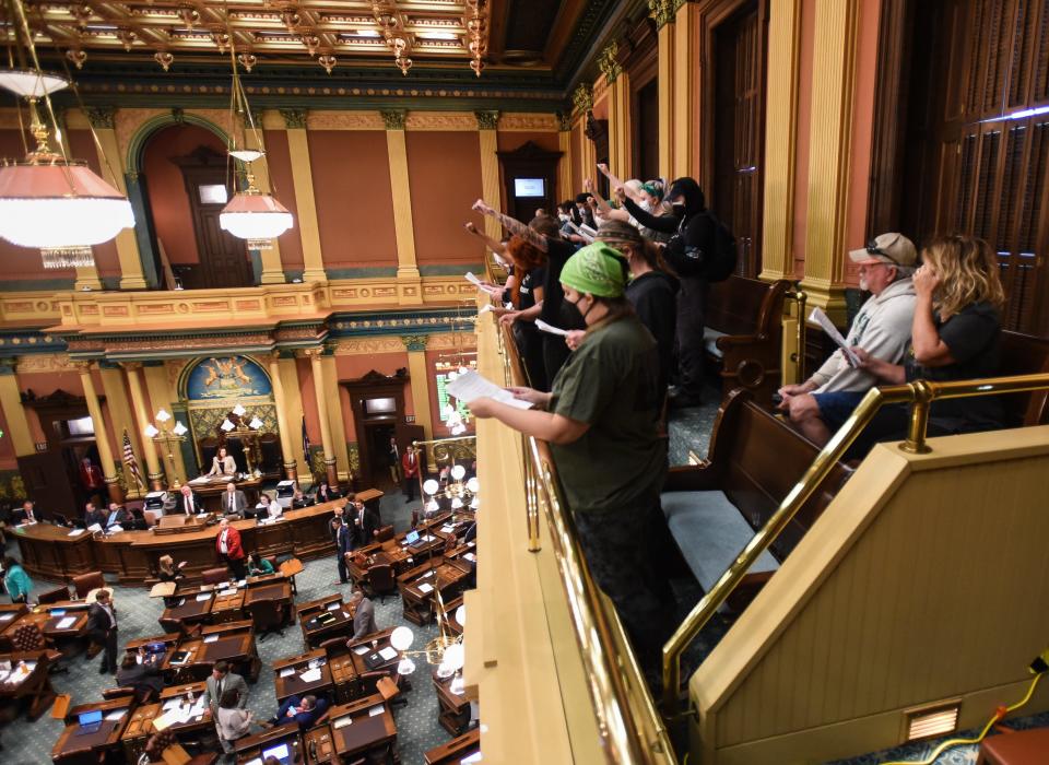 Pro-choice advocates demonstrate in the house gallery Wednesday afternoon, June 8, 2022, demanding the repeal of the 1931 Michigan abortion ban. The event was organized by the Michigan Coalition for Reproductive Liberation.