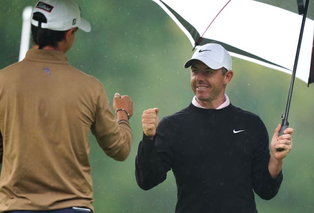 Rory McIlroy bumps fists with Matteo Manassero