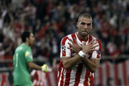 Olympiakos' Pajtim Kasami celebrates his goal during their Champions League soccer match against Juventus at Karaiskaki stadium at Karaiskaki stadium in Piraeus, near Athens, October 22, 2014. REUTERS/Alkis Konstantinidis