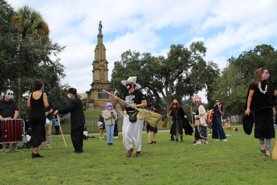 Witches gather in Savannah's Forsyth Park to celebrate Halloween with social distancing.