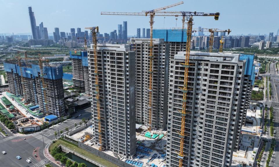 <span>Residential construction in Nanjing. The price of new homes in 70 cities in China fell by 0.7% from April, the steepest drop since October 2014.</span><span>Photograph: Costfoto/NurPhoto/Rex/Shutterstock</span>